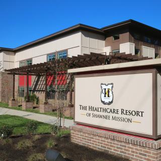 The Healthcare Resort of Shawnee Mission building exterior with signage.