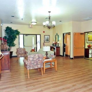 A cozy lobby area with comfortable seating and warm lighting.