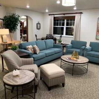 Cozy living room with comfortable seating and elegant decor.
