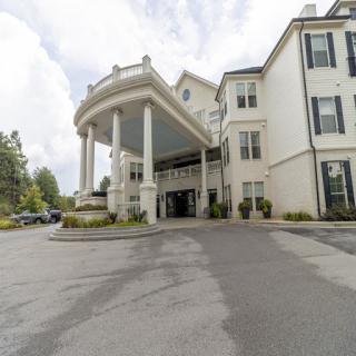 A grand hotel entrance featuring classical architectural elements.