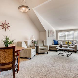 A cozy living room with comfortable seating and stylish decor.