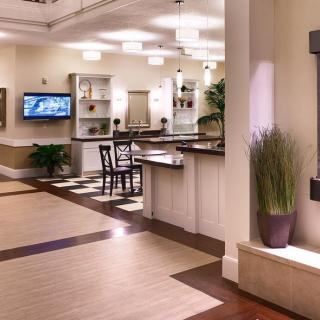 A modern hotel lobby with stylish furnishings and elegant lighting.