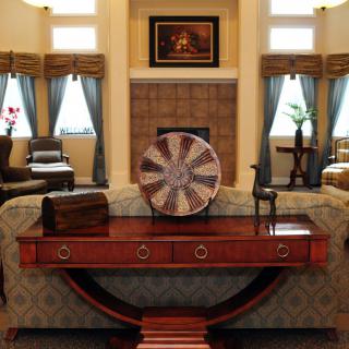 A modern and elegant living room with stylish furniture and decor.