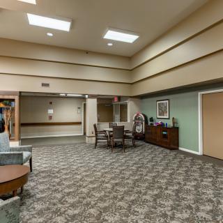 A spacious lobby with comfortable seating and well-lit surroundings.