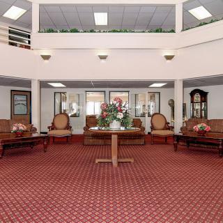 Elegant lobby with traditional furniture and decor.