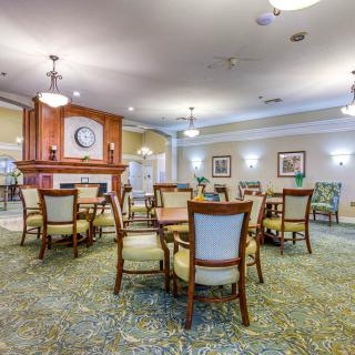 A cozy dining area with elegant furnishings and a warm ambiance.
