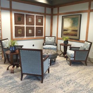 A cozy lounge area featuring comfortable seating and modern decor.
