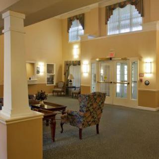 A warm and inviting lobby with comfortable seating and soft lighting.