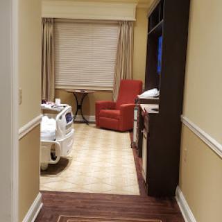 A view of a hospital room showcasing the interior design and furnishings.