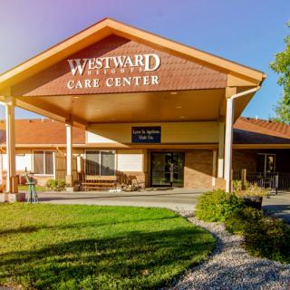 The entrance of Westward Care Center on a sunny day.