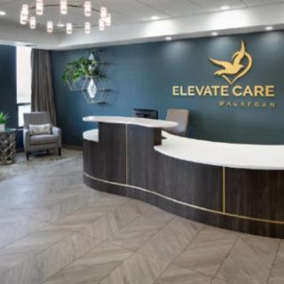 A modern reception area featuring a sleek desk and comfortable seating.