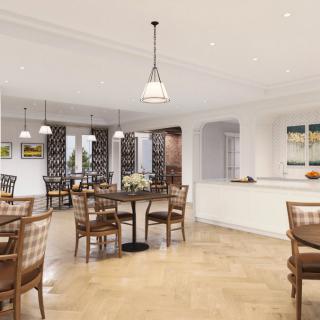 Spacious dining area with modern decor and ample seating.