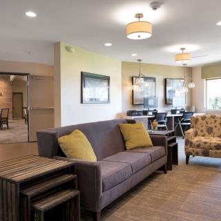 A modern living room with a cozy sofa and stylish lighting.