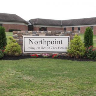 Signage for Northpoint Healthcare Center, surrounded by well-maintained landscaping.