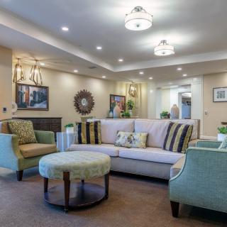 A cozy living room with elegant furniture and soft lighting.