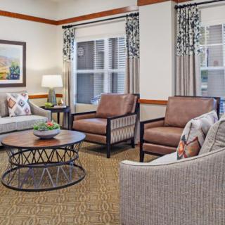 A cozy living room with comfortable seating and tasteful decor.