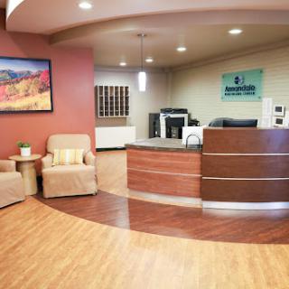A modern reception area with comfortable seating and a welcoming design.