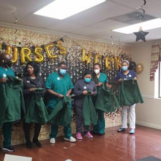 Healthcare professionals celebrating their dedication and hard work.