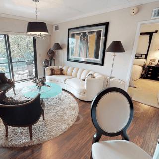A modern living room with elegant furniture and stylish decor.