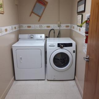 A laundry room featuring a washing machine and dryer.