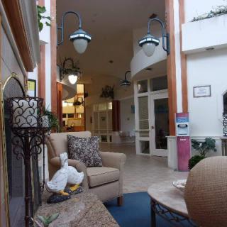 A cozy lobby with comfortable seating and elegant lighting.