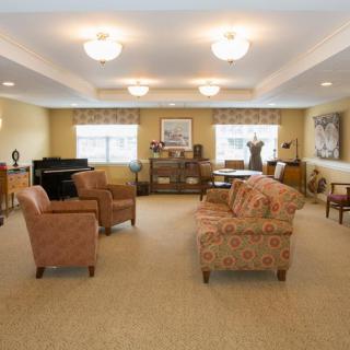 A cozy living room with comfortable seating and warm decor.