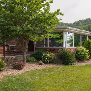 A charming residential home with a beautifully landscaped garden.