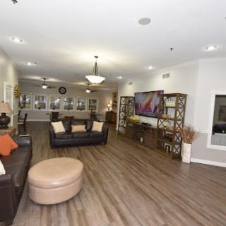 A spacious and modern living room designed for relaxation and socializing.