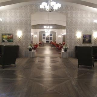 A stylish hotel lobby featuring modern furniture and elegant decor.