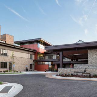 A modern healthcare facility with a welcoming entrance and contemporary architecture.