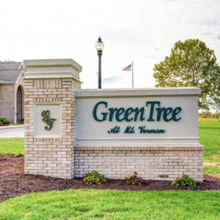 Entrance sign for Green Tree golf course.