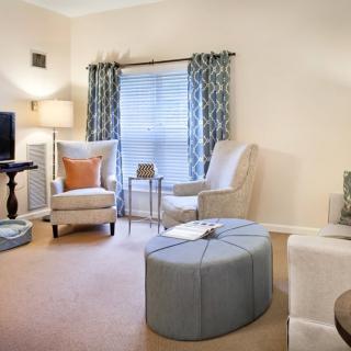 A cozy living room with comfortable seating and stylish decor.