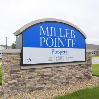 A sign for Miller Pointe, a prominent landmark in the area.