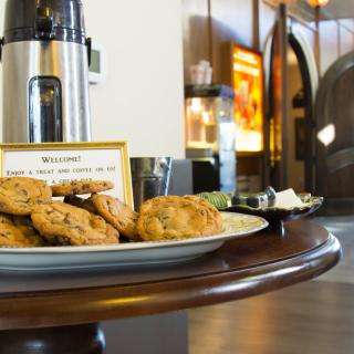 A welcoming display of cookies and coffee ready for guests.
