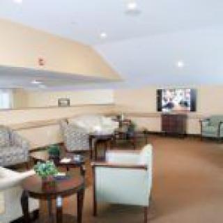 A cozy living room with comfortable seating and a television.