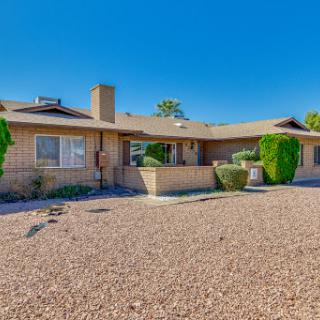 Charming single-story home with a well-maintained exterior and landscaping.