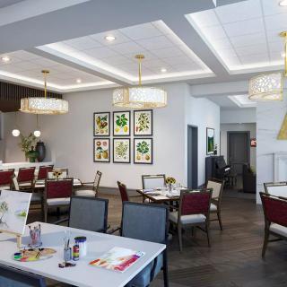 Modern restaurant dining area with elegant lighting and contemporary decor.