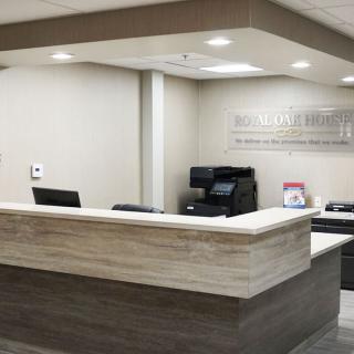 A modern office reception area with a sleek, minimalist design.