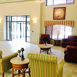 A cozy lobby with comfortable seating and elegant decor.