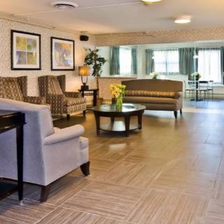 A modern lobby interior with comfortable seating and stylish decor.
