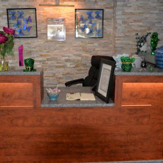 A modern reception area with floral decorations and a welcoming atmosphere.