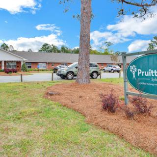 PruittHealth facility with a welcoming entrance and well-maintained surroundings.