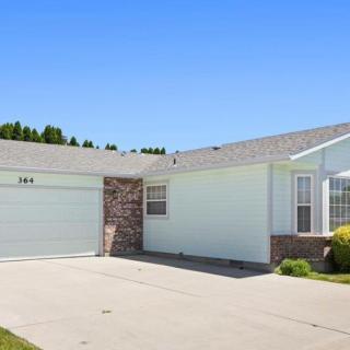 A typical suburban house with a driveway and garage.
