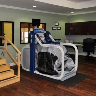 An anti-gravity treadmill in a physical therapy and rehabilitation setting.