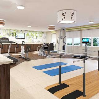 A modern gym with various exercise equipment including treadmills and yoga mats.
