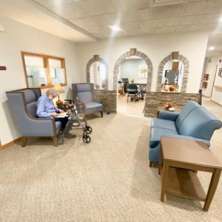 A well-furnished lobby area with comfortable seating and modern decor.