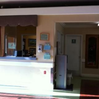 A reception desk area in an office or hospitality setting.