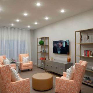 A modern living room with comfortable seating and stylish decor.