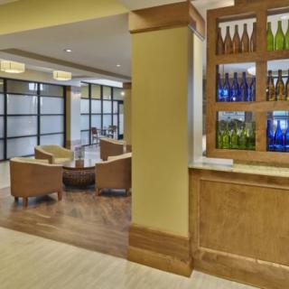 A modern lobby with a cozy seating area and stylish decor.