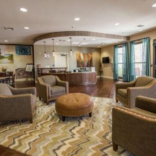 A welcoming seating area with modern furnishings and a cozy atmosphere.